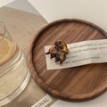 Close-up of mini tortoise shell hair claw on a wooden tray with minimalist aesthetic - Golden Brown Floral