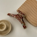 Macro detail of large tortoise shell acetate hair claw with vintage marble texture - Green Brown-Acetate