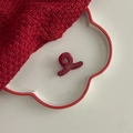 Detailed close-up of dark red acetate hair claw clip with golden France Handmade lettering - Small Y-Shape Clip