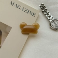 Detail of handmade amber resin bear hair clip with France engraving on fabric - Milk Coffee