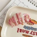 Detail view of pink and white striped acetate hair claw clip with golden YD logo insert - Pink