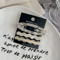 Close-up detail of a 3pcs minimalist acetate hair clip set featuring marble patterns - Apricot Rice (Wavy And Oval Clip Set)