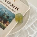 Macro shot of green mini acetate hair claw clip with gold handmade text on fabric - Green Stripe