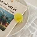 Close-up of yellow resin mini hair claw clip featuring France Handmade engraving - Lemon Yellow