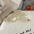 Elegant pearlescent cream acetate bow hair claw clip with gold VD logo detail - Mermaid White