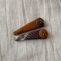 Detail of vintage fabric hair clips with gold bow accents and plaid patterns on linen - Yellow Green Bow Clip Pair