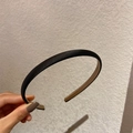 Minimalist black thin headband with satin fabric texture for a high-volume hair look - Ultra Thin Style / Black