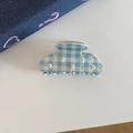 Detail shot of a blue and white checkered hair claw clip with 3D floral and rhinestone accents - Blue Plaid