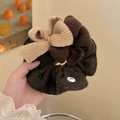 Detailed knit texture of autumn stripe scrunchie with bow knot and decorative charm - Dark Gray Scrunchie