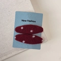 Detail of red plaid BB hair clips with white dots on a blue display card for women - Red Polka Dot Oval