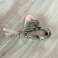 Macro shot of dark marble texture acetate hair claw clip with heart detail on linen - Creamy White Heart Style (Style A)