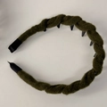 Detail of army green knitted cable twist headband with non-slip inner teeth for hair styling - Green