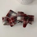Detail view of red and grey plaid bow hair clip with black sturdy plastic teeth - Red Plaid