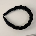 Detail showing inner non-slip teeth design and black knitted wool texture of the headband - Black