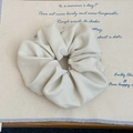 Elegant off-white oversized scrunchie in premium faux suede with soft pleated texture - Off-white