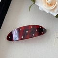 Detailed view of red-brown tortoiseshell acetate hair clip with sparkling rhinestones - Brown Spring Clip