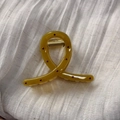 Detail of mustard yellow hair claw clip with red polka dots and golden metal spring - Mustard Yellow Crisscross Style