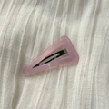 Close-up of pink acetate triangle hair clip with FRANCE Handmade text engraving - Light Purple