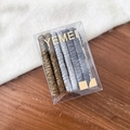 Detail of high-elasticity fabric hair ties in neutral brown and grey tones with gift box - Blue Green Gray