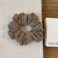 Minimalist dark brown knitted scrunchie with soft wool texture for warm autumn styling - Khaki