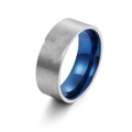 Dettaglio macro dell'esterno in acciaio spazzolato e del rivestimento interno blu lucido - US 7 / Argento
