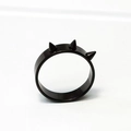 Detail of a black punk gothic ring with three sharp spikes on matte stainless steel - US 6 / Black