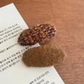 Detail view of oval tweed and plush fleece hair clips in warm brown autumn tones - Brown Tweed And Dark Brown Fuzzy Style / Coffee Colors