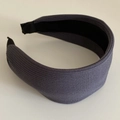 Detailed view of the dark grey knitted headband showing high-quality woven fabric texture - Gray