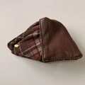 Macro shot of faux leather and plaid fabric patchwork detail on the triangular hair clip - Hair Claw / Brown