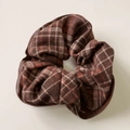 Detailed close-up of British retro red plaid and leather patchwork hair scrunchie design - Scrunchie / Brown