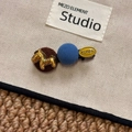 Detail of Korean hair clip with golden horse, blue fabric ball and yellow Korea charm - Blue Coffee Horse Hair Clip