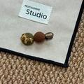 Detail view of Korean style hair clip with golden horse and green tweed texture - Coffee Green Horse Hair Clip