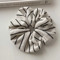 Detail of knit striped scrunchie with white 'Hand Made' woven label on minimal background - Rice White Large