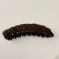 Detail showing plush brown faux fur leopard print banana hair clip for ponytails - Felt Coffee