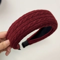 Close-up of deep burgundy cable-knit headband with non-slip inner base and soft ends - Red Headband