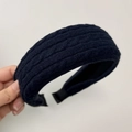Detail of dark blue cable knit headband showing thick braided texture and inner lining - Navy Blue Headband