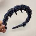 Detailed close-up of blue plaid headband featuring anti-slip inner teeth and handmade label - Navy Blue Plaid Toothed Headband