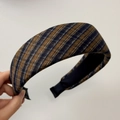 Close-up of brown and navy striped fabric texture on a wide-brimmed padded headband - Yellow Blue Plaid Headband