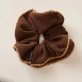 Close-up of brown corduroy scrunchie with plush trim and a handmade label - Coffee Double-sided Style