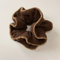 Macro detail of brown knitted scrunchie with soft faux fur trim and pleated texture - Coffee Cinch Style