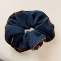 Detail of navy knit scrunchie with brown plush trim and handmade label detail - Blue Double-sided Style