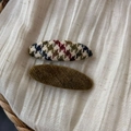 Close-up of retro knit hair clips with plaid patterns and olive green velvet texture - Yellow Green Oval