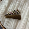 Detailed close-up of knit herringbone and olive green plush teardrop hair clips - Yellow-Green Triangle