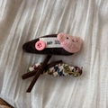 Close-up of corduroy and plaid hair clips featuring plush bear and handmade bow details - Coffee Bear Head
