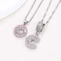 Silver alphabet C pendant necklace with pink baguette crystals and flower cluster - Silver C