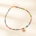 Collier bohème en perles colorées avec pendentif lettre Q dorée et chaîne de réglage - Lettre Q