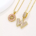 Golden necklace set with letter W pendant and pink baguette crystals for women - Gold W