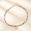 Collier de perles colorées bohème avec pendentif lettre X doré et chaîne ajustable - Lettre X