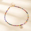 Collier de perles colorées fait main avec pendentif rond doré et lettre Z bleue - Lettre Z
