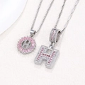 Pink gemstone and diamond pavé letter H necklace set in polished silver finish - Silver H